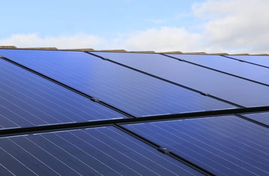 Close-up of solar panels on a house roof