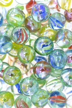A close up shot of glass marbles