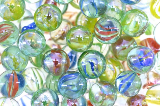A close up shot of glass marbles