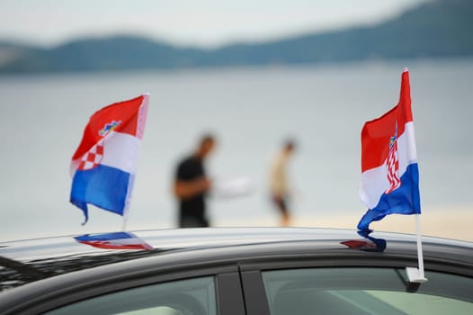 Croatian flag attached to car windows
