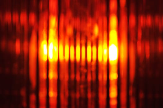 Construction site background with macro detail of an orange all-round light