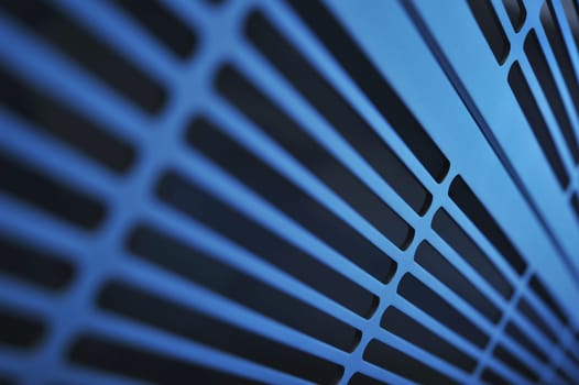 abstract industrial background made of aluminium ventilation grilles