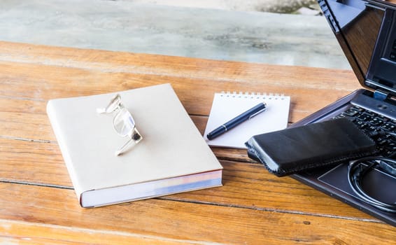 Wherever working table with laptop and stationary, stock photo