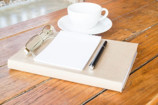 Creative time with cup of coffee and book, stock photo