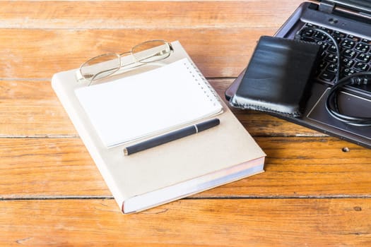 Easy working table with laptop and stationary, stock photo