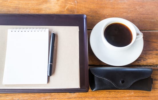 Simple work table with cup of coffee, stock photo