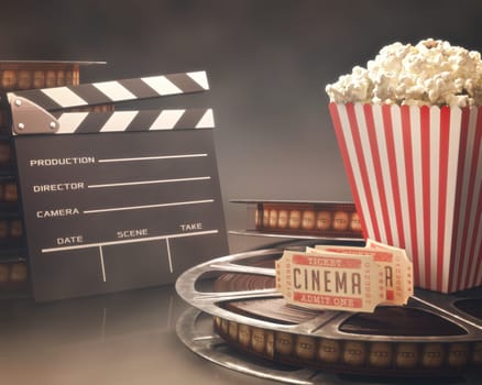 Objects related to the cinema on reflective surface.