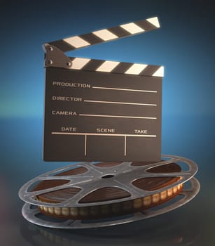 Clapperboard and roll of film in the retro concept cinema.