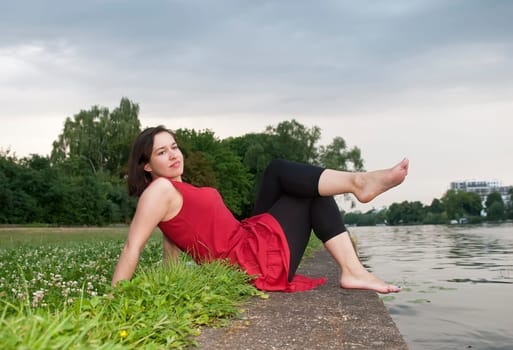 young woman by the river