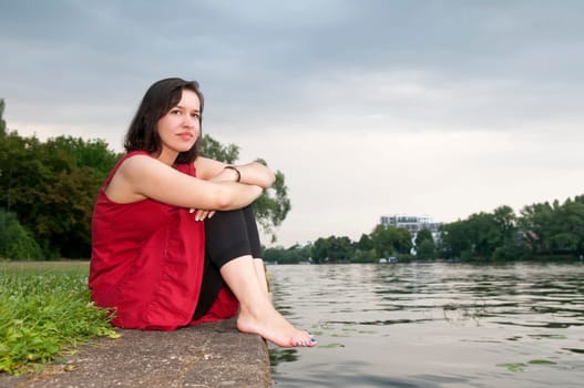 young woman by the river