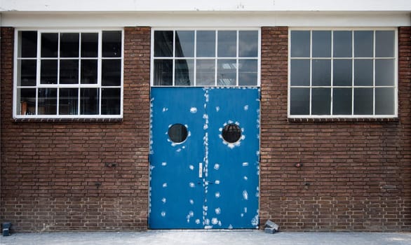 Blue door of an historic toothpaste factory in Amersfoort, the Netherlands.