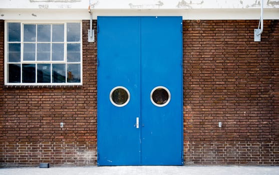Blue door of an historic toothpaste factory in Amersfoort, the Netherlands.