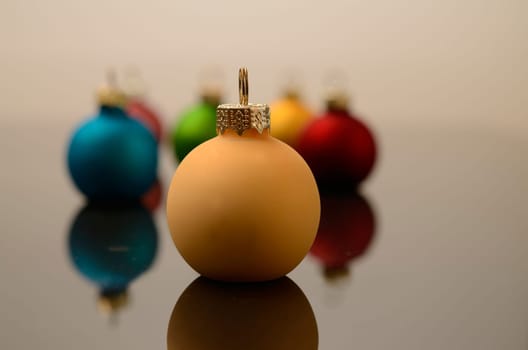 Colorful Christmas baubles with reflections