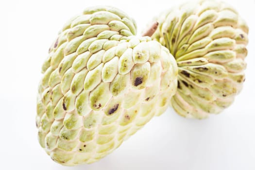 Couple fresh custard apple with geen peel