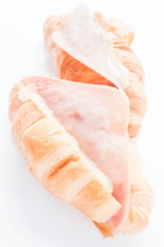 Couple of ham cheese croissants isolated on white background