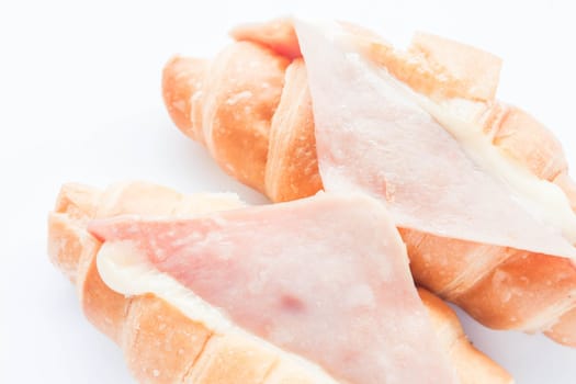 Close up ham cheese croissants isolated on white background