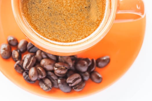 Espresso shot and coffee bean isolated on white background