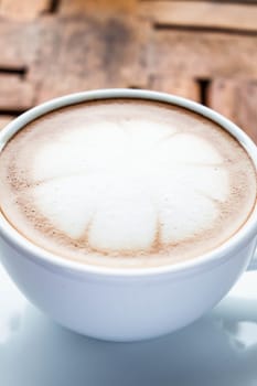 Microfoam of milk topped on hot cafe mocha