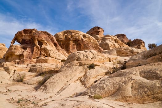 Fascinating eroded sandstone rock formations in the vicinity of the ancient nabatean town Petra in todays Jordan