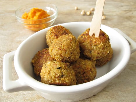 Falafel balls with carrots dip