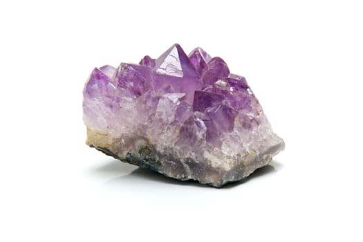 Close up of purple amethyst cluster with many points, shot on white background