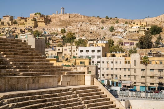 A view over the ancient Roman Theatre in Jordan's capital Amman to the downtiwn district and the Citadel in the background