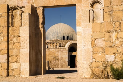 View through a gate to the Umayyad Palace at the ancient citadel of Amman