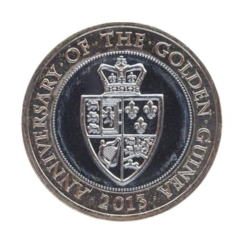 LONDON, UK - JUNE 28, 2014: Celebrative Two British Pound coin for the Anniversary of the Golden Guinea in 2013