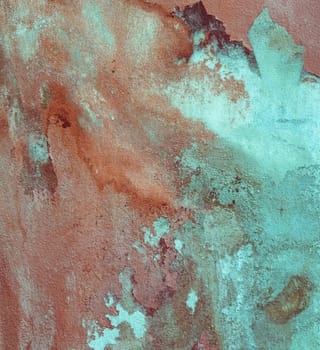 Wall texture of weathered red paint peeling off
