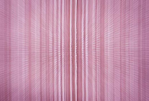 Abstract pink fabric with zoom burst