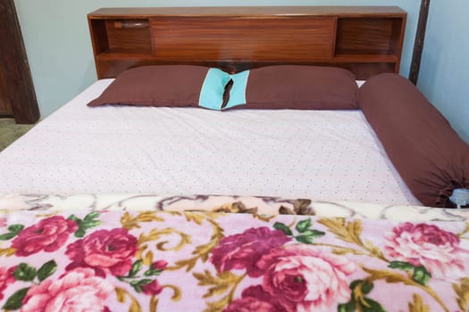 Tranquil bedroom with a double  hard wood bed