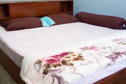 Tranquil bedroom  with a double  hard wood bed