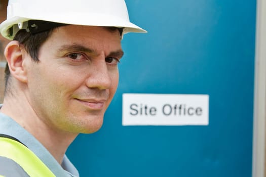 Portrait Of Construction Worker At Site Office