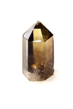 A smokey quartz crystal point standing on end, shot on white background.