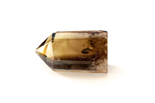 A smokey quartz crystal point laying on its side, shot on white background.
