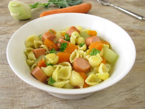 Noodle soup with sausages