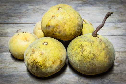 Santol fruit  on wood background