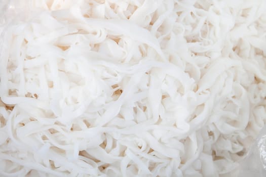 Asian white rice noodles close up background