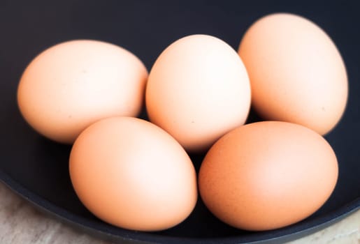 Easter egg group in a black tray
