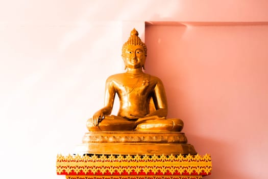 Sitting bronze buddha image statue at front