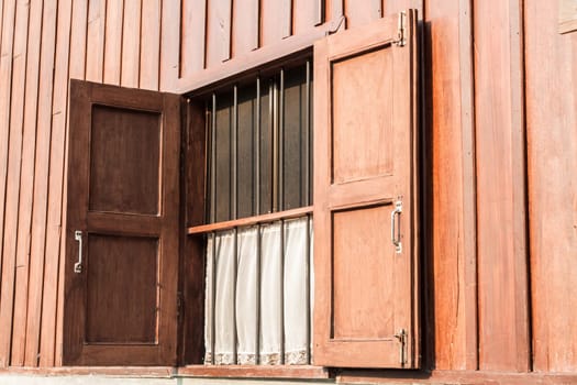 Wood window of wood and cement house