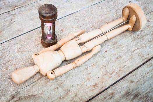 Wood mannequin and hourglass display renewly life time