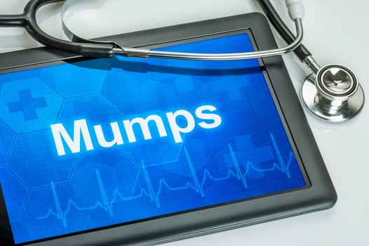 Tablet with the diagnosis mumps on display