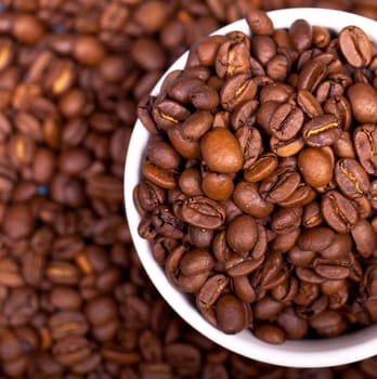 Coffee beans in a cup