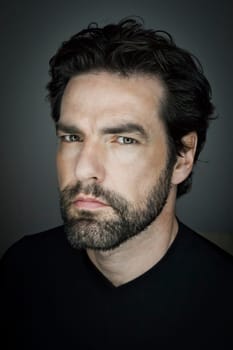 An image of a handsome man with a beard