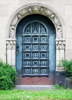 Grave door at Melaten Friedhof in Cologne, Germany.