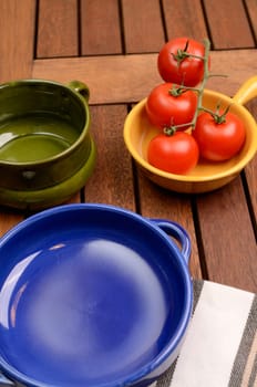 Empty plates on a wooden table