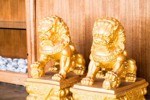 Chinese style figurine golden singha partner
