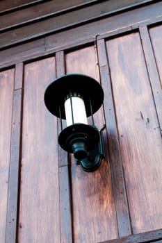 Vintage wood wall with walkway retro lamp
