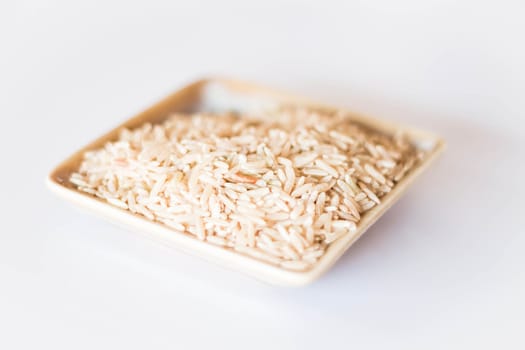 Brown rice cereal food on clean table